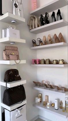 several shelves with purses and handbags on them