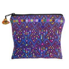 a purple and blue zippered pouch with an orange tassell