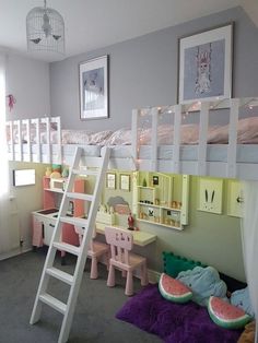 a room with bunk beds, desks and chairs on the carpeted floor next to a window