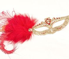 Red feathers Gold Masquerade Mask woman, Red Rhinestone Gold Lace mask red feather mask women, Mardi Gras, Venetian mask, prom masks red Lightweight lace base painted & embellished in colors listed or custom painted to match your outfit. If you chose mixed Rhinestone color option, pls leave a note during check out with the color choices. Feel free to request images of rhinestones if you are unsure what shade is needed to match your attire. S H I P P I N G - Processed same day or within 24 ho Mask Prom, Burning Man Accessories, Masquerade Mask Women, Elegant Face Mask, Mask Woman, Couples Masquerade Masks, Gold Masquerade Mask, Festival Headpiece, Bridal Mask