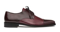 Style: Soka-Burgundy A stunning combination of Deerskin and Polished Calfskin accent this lace-up Blucher oxford from the Mezlan collection, featuring a cap-toe and a stitched, wheeled welt, and detailed with Polished Calfskin wrapped tassel ends! Handmade in Spain. Luxury Cap Toe Oxfords For Derby, Luxury Fitted Cap Toe Oxfords, Elegant Fitted Lace-up Derby Shoes, Elegant Fitted Lace-up Derby, Luxury Fitted Cap Toe Derby, Elegant Cap Toe Lace-up Shoes For Derby, Elegant Burgundy Cap Toe Oxfords, Elegant Burgundy Oxfords For Formal Wear, Elegant Burgundy Oxfords For Formal Occasions