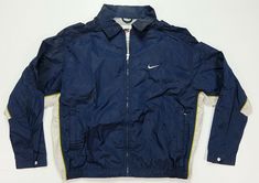 Rare VTG NIKE Swoosh Striped Full Zip Windbreaker Track Jacket 90s 2000s Size XL 24.5” - pit to pit 27” - top of back collar to waist 21.5” - pit to wrist flaws -light brown discoloring spots on the front of right shoulder -light brown discoloring on front of chest and near left armpit -light brown discoloring around collar -light brown discoloring around the back of left shoulder Thanks for checking out  DasCardHaus! We provide you great deals on sports cards, collectables, records, books, and Nike Track Jacket For Streetwear And Sports Season, Nike Windbreaker For Sports Events, Nike Casual Windbreaker For Streetwear, Men 90s, Vintage Nike Jacket, 90s 2000s, Nike Swoosh, Sports Cards, Track Jacket