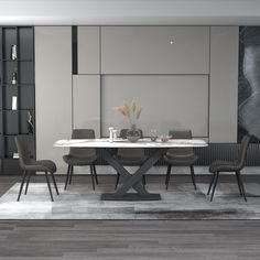 a modern dining room with grey chairs and a white table surrounded by black bookshelves