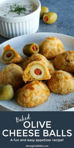 baked olive cheese balls on a white plate