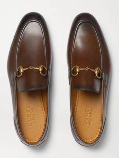 Gucci designed its first loafers back in the '50s and they've been worn by countless stylish men in the intervening years. Made from smooth burnished-leather, this 'Jordaan' pair has supple linings and is finished with the signature gold horsebit across the front. Gucci Trousers, Gucci Blazer, Gucci Shoes Loafers, Loafers Gucci, Gucci Jordaan, Gucci Collection, Gucci Shirts, Mens Leather Loafers, Gucci Shirt