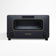 a black toaster oven sitting on top of a counter