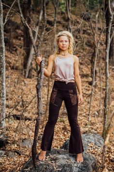 These brown long flared legging pants feature pockets with gold paisley block print and a high waistband. Made or lovers of alternative earthy, tribal, festival, boho clothing with a natural vibe. Model is wearing a size small check sizing chart for measurements and sizing conversion for your country. Made from 95% cotton 5% lycra. Care Instructions- Wash gently inside out in cool water by hand or a very gentle machine was, dry inside out away from direct sunlight, no dryer. Respect these instru Flare Pants Boho, Stretch Clothes, Brown Flare Pants, Brown Flares, Pixie Outfit, Flare Legging, Festival Pants, Legging Outfits, Festival Clothing