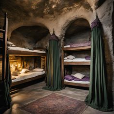 there are bunk beds in the cave with drapes on them and curtains hanging from the ceiling