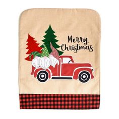 a red truck with a christmas tree on the back and merry christmas written on it