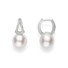 Shapely and sparkling are two words that aptly describe these pearl and diamond hoop earrings from Mikimoto. Crafted in 18K white gold, they feature an 8mm Akoya pearl at the end of a gemstone-embellished elongated triangle. These elegant Mikimoto earrings are a modern classic with a forward-looking design that is ideal for today's forward-thinking women!