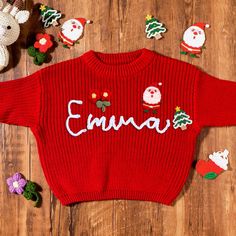 Hand Embroidered Christmas Santa Baby Sweater,Christmas Baby Knitted Jumper, Newborn First Christmas Gift, Customized Christmas Sweater This embroidered baby sweater subtly presents the baby's name on the soft sweater, making it a loving and warm baby gift. Every stitch and every line are full of deep blessings for the baby, which not only highlights its unique personality, but also shows the high quality of production. It's more than just a kids' sweater, it's a gift that can be treasured for a Pregnant Christmas Sweater, Santa Baby Sweater, Embrodered Newborn Crewneck Sweater, Baby Christmas Sweater, Baby Sweater Romper Christmas, Christmas Surprise, Pull Bebe, Christmas Accessories, Santa Baby