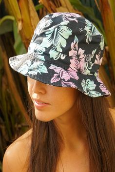 Take some shade in our Luna Bucket Hat. This up-cycled 100% cotton bucket hat features a navy and white Hawaiian print and a custom aqua and lilac colored tie dye. It's the perfect accessory for all your sunny days. Every hat is hand tie dyed with love and no two hats are exactly the same. 100% Cotton One size fits most Hand wash Flower Bucket Hat, Tie Dye Bucket Hat, Cotton Bucket Hat, Hand Tie, Carbon Offset, Lilac Color, Hawaiian Print, Printed Ties, Tie Dyed