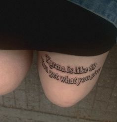 two legs with words written on them and one has a small tattoo that reads,'today is like go get what you want '