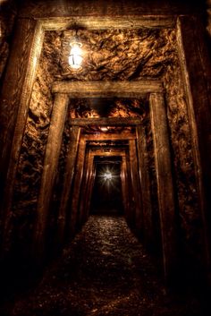 an empty tunnel with light at the end