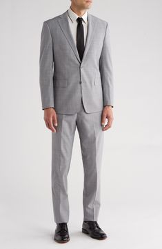 Crafted from a luxurious wool blend, this suit will have you looking sharp for your next special occasion. Jacket has notched lapels; four-button cuffs; chest pocket; flap pockets; interior pockets Trousers have zip fly closure; slant pockets; back button-welt pockets Jacket is lined; trousers are lined to the knee 70% wool, 30% polyester Dry clean Imported Male Wedding Guest Outfit Formal, Male Wedding Guest, Wedding Guest Outfit Formal, Male Wedding Guest Outfit, Male Wedding, Calvin Klein Collection, Pocket Jacket, Guest Outfit, Wedding Guest Outfit