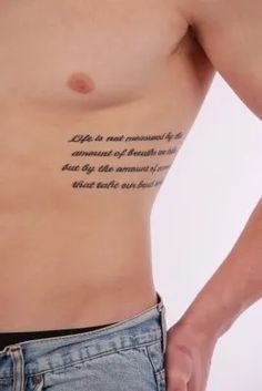 a man's chest with the words life is not measured