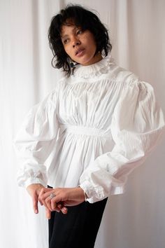 Spectacular and rare late regency period blouse, circa 1820s (or maybe older I'm not entirely sure). This stunning piece features graduated mutton sleeves with a fabulous cut, tiny hand embroidered floral details in white color, a double frilled collar, empire pleated waist and inner waist ties to close it. Definitely a collection or museum worthy piece! NB: I'm not sure if the open side what meant to be worn on the front, anyway both way to do are stunning! -Label: None -Size : please refer to Victorian Ruffle Collar, Pleated Bodice, Ruffled Collar, Edwardian Fashion, Style Change, Cotton Blouse, Style Expert, Cotton Blouses, Sleeve Cotton