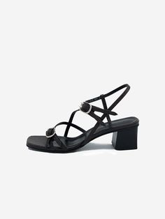 - Square open toe- Mid heel- Cross strappy sandals- Adjustable double buckle detail- Pattern embossed leatherMeasurements- Heel: 1.9in- Size: KR230(US6)-250(US8)- This item is based on the KR shoe size. Please refer to the size chart.Composition- Upper: Kipskin- Lining: SheepskinDesigner- Made in Korea- by HYOON- Style#: 300949785 Evening Leather Slingback Sandals With Tang Buckle, Formal Sandals With Buckle Closure And Single Toe Strap, Evening Open Toe Slingback Sandals With Tang Buckle, Evening Sandals With Rectangular Buckle, Modern Block Heel Sandals With Tang Buckle, Modern Open Toe Heels With Tang Buckle, Evening Heels With Tang Buckle And Single Toe Strap, Formal Square Toe Sandals With Strap, Formal Sandals With Tang Buckle And Block Heel