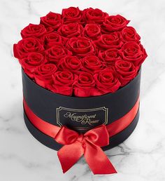 a black box with red roses in it