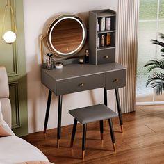 a bedroom scene with focus on the dressing table and mirror, along with a plant