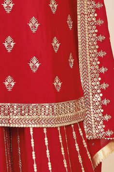 This Red Chinon Silk Embroidered Palazzo Salwar Suit is a fine choice for traditional wedding parties and special occasions such as Karwa Chauth. It features Mirror Effect, Zari and Sequins Work and is designed with a Round Neck and Full Sleeves. Also included is a Red Chinon Chiffon Palazzo and a matching Red Chinon Chiffon Dupatta. Its eye-catching red hue and heavy embroidery make it an extraordinary ensemble. 3 piece Kameez chinon silk with heavy embroidery mirror zari & sequin work Palazzo Wedding Red Palazzo Set With Dabka Work, Long Sleeve Traditional Sharara For Ceremonies, Festive Georgette Kurta For Traditional Ceremonies, Festive Embroidered Palazzo Set For Celebration, Red Embroidered Georgette Unstitched Suit, Festive Zari Work Palazzo Set For Traditional Ceremonies, Embroidered Red Georgette Unstitched Suit, Red Unstitched Suit With Intricate Embroidery For Festive Occasions, Embroidered Red Unstitched Georgette Suit