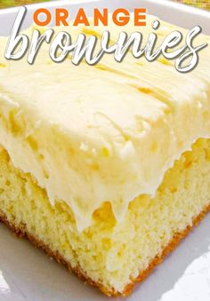 a close up of a piece of cake on a plate with the words orange brownies