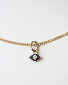 14k gold evil eye necklace with diamond.Simple, minimalist everyday necklace - Effortlessly chic.Perfect wearing alone or layering with your favorite necklaces.You can wear it everyday all day, and don't have to worry about tarnishing it. Charm measures approx. 6mm Chain Length: 18" 70s Sewing Patterns, Gold Evil Eye Necklace, Necklace With Diamond, Long Chain Earrings, Evil Eye Necklace Gold, Pearl Collection, Belly Chain, Everyday Necklace, Evil Eye Necklace