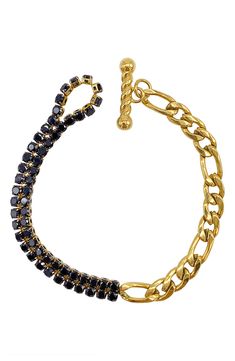 Contrasting black crystals add an edgy appearance to this water-resistant figaro chain bracelet. 7.5" length; 6mm width Toggle closure This piece of jewelry is water-resistant and will not tarnish with water contact 14k yellow gold plated stainless steel/glass crystal Imported Elegant Black Curb Chain Jewelry, Black Metal Curb Chain Bracelet, Trendy Black Link Jewelry, Black Metal Bracelet With Curb Chain, Adjustable Black Chain Link Jewelry, Adjustable Black Link Chain Bracelet, Black Chain Link Jewelry With Lobster Clasp, Black Link Bracelets With Adjustable Chain, Trendy Black Chain Bracelet