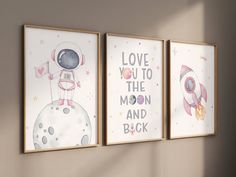 three children's art prints on the wall