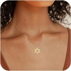 Elevate your style with this stunning Gold Star of David Necklace ✨ Perfect for everyday wear or as a thoughtful gift for a special occasion 🎁 #StarOfDavid #ReligiousJewelry #BaptismGift #NecklaceForWomen #GoldPendant Jewish Star Necklace, The Star Of David, Jewish Necklace, Star Of David Necklace, Jewish Star, Jewish Jewelry, Star Of David Pendant, Christian Jewelry, Star Of David