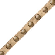 a beige belt with metal buttons on it