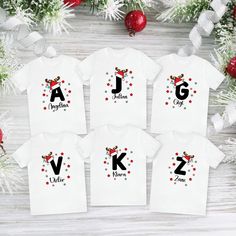 Personalized Christmas Family Shirt, Family Christmas Matching Shirt, Christmas Custom Name Initial Shirt, Christmas Group Tee, Monogram shirt Celebrate Christmas this year with a Family Christmas Matching Shirt. Also an Amazing Christmas gift. Order yours Now! Standard Fit T-Shirts: Our shirts are Unisex, please refer to the sizing charts in the product pictures before ordering.  100% Quality Shirt Guaranteed. Super Soft and Comfortable Made and Printed in the USA. All of our shirts are printed Family Matching Holiday Tops With Letter Print, Family Name Christmas Tshirts, Family Matching Holiday T-shirts With Letter Print, White Family Matching Christmas T-shirt, Family Matching Christmas T-shirt With Letter Print, Monogram Shirts, Family Christmas Shirts, Matching Shirts, Custom Christmas