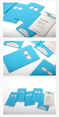 some blue paper cut out to look like business cards