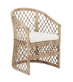 a wicker chair with a white cushion