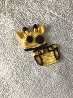 "Are you looking for an animal halloween costume for you baby?  This giraffe 2-piece outfit would be perfect.  It would also make a great photo prop. This hand crocheted giraffe hat and diaper cover is so soft and luxurious to the touch.  It is made from 100% acrylic yarn. The main body of the giraffe set is a  sun yellow.  The diaper cover has an adjustable waist band.  Just move over the button to make it larger or smaller. Check out the chocolate brown spots on the hat.  The hats circumference is 14\" and is sized 0-3 months. The diaper cover is sized 0-3 months.  I recommend machine wash gentle and lay flat to dry.   >0-3 months >Hat circumference is 14\" >100% hand crocheted >100% acrylic yarn >Machine wash gentle/lay flat to dry >Pattern by Ava Girl Designs >Baby doll not included >R Crocheted Giraffe, Halloween Costume Newborn, Baby Animal Costumes, Newborn Christmas Outfit, Giraffe Hat, My First Christmas Outfit, Infant Halloween, Baby Summer Hat, Animal Halloween Costumes