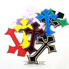 the letters k are made up of different colors and shapes with black, yellow, red, blue, green, and purple