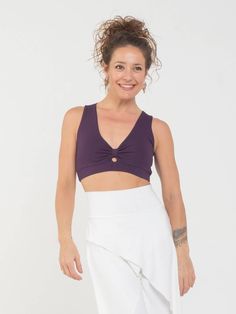 This supportive rayon jersey bra top has a generous cut and can be worn on it's own or as a bra. It stretches to fit and is not constricting around the neck or back. We find it to be a comfortable and supportive for activities like dance and yoga. Also available in Black/Grey Stripe and Gold Stripes. [#details] Size Suggestions S: 2-4 M: 6-8 L: 10-12 [/details] [#fabric] Rayon Lycra: 90% Rayon (Viscose) / 10% Spandex (Lycra) [/fabric] Stretch Triangle Crop Top With Built-in Bra, Bra Friendly Triangle Yoga Top, Yoga Triangle Top With Built-in Bra, Yoga Halter Top With Built-in Bra, Stretch Halter Top With Built-in Bra For Yoga, Yoga Crop Top Sports Bra With Built-in Bra, Halter Top With Built-in Bra For Yoga, Bra-friendly Yoga Crop Tops, Bra-friendly Crop Halter Top For Yoga