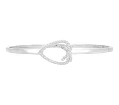 Celebrate the unbreakable bonds of love with this Goddaughters Love Knot Heart Bangle. Crafted from sterling silver, this elegant piece is a constant reminder to treasure yourself and your loved ones. Its intricate design symbolizes true friendship and eternal love, making it a meaningful addition to any jewelry collection. From Goddaughters. True Friendship, Love Knot, Daughter Of God, Eternal Love, Intricate Design, Of Love, Knot, Jewelry Collection, First Love