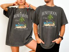 Embrace your love story with our Custom Honeymoon Club T-Shirt from the Comfort Colors Collection! Designed for comfort and style, this soft, relaxed-fit tee is perfect for newlyweds looking to celebrate their special journey together. Whether you're exploring a new city, lounging at your resort, or simply enjoying each other's company, this t-shirt is a delightful way to commemorate your love. It also makes a thoughtful gift for bridal showers or wedding celebrations. Celebrate your honeymoon in style and comfort with this must-have piece that you'll cherish long after the trip is over! >>PLACING AN ORDER<< select the STYLE+SIZE & COLOR followed by the size (PLEASE NOTE: these are all unisex items (shirt, sweatshirt) so make sure to check out our sizing guide located in the listing) Comfo Matching Honeymoon Outfits, Honeymoon Outfits Night, Graphic Print Crew Neck Top For Honeymoon, Finally Honeymoon Shirts Matching, Honeymoon Couple Tshirts, Summer Crew Neck T-shirt For Honeymoon, Just Married Honeymoon Shirts, Mr And Mrs Honeymoon Shirts, Honeymoon Shirts