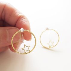 🌿 Made with 2cm diameter 14k gold plated Star Circle with Swarovski Crystals! 👉🏻 You can choose your earrings closure * Invisible Clip On (for non-pierced ears) or 14k Gold Plated Post (for pierced ears)! ✏️ It's around 2cm in diameter. ✌🏻Sold as a PAIR 💖 It is the most comfortable clip on earrings, it had been tested on myself, my daughter and my friend! They are secure and comfortable! If you have non-pierced ears like us, you will fall in love with this and make yourself look great every Minimalist Gold Hoop Earrings With Star Charm, Everyday Gold Star-shaped Hoop Earrings, Hypoallergenic 14k Gold Star Jewelry, Yellow Gold Star Earrings For Everyday, Everyday Star-shaped Yellow Gold Earrings, Everyday Yellow Gold Star Earrings, Hoop Jewelry With Star Charm As A Gift, Dainty Round Earrings With Star Charm, Gold Star-shaped Pierced Jewelry