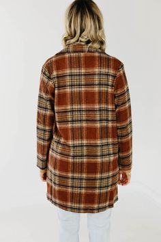 FINAL SALE Description The Shayla features a single button closure on the front, pressed lapel, longer length, and a collared neckline. This plaid is all fall featuring rusty oranges, tans, and browns. Style with a button front henley for added texture or just pair with a cozy sweater and booties! This may be your new go-to fall coat option! Be sure to check the measurements and fit guide below to find the best fit for you! Sizing True to size Model is wearing a size small Small - Bust 44" // Le