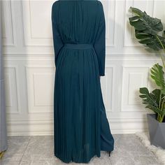 This beautiful nida pleated jumpsuit dress is the perfect outfit for any occasion. Includes with a belt, wide legged pants, long-sleeved arms, and a chiffon dress overlay. Available in 5 colours. Solid Color Maxi Dress For Work, Chiffon Belted Dress For Party, Elegant Belted Chiffon Dresses, Elegant Chiffon Belted Dresses, Long Sleeve Chiffon Dress With Pleated Sleeves, Formal Maxi Dress With Belt, Green Chiffon Maxi Dress For Fall, Elegant Long Maxi Dress In Solid Color, Flowy Belted Maxi Dress For Party