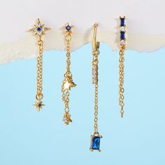 Material: Brass Color: Tz00073 Gold Fashion Element: XINGX Style: Fashion OL Elegant Single Blue Cartilage Earring, Elegant Blue Single Cartilage Earring, Elegant Blue Cartilage Earrings For Gift, Pink Celestial, Earrings Multiple, Perfume Jewelry, Planet Earrings, Aesthetic Earrings, Celestial Earrings