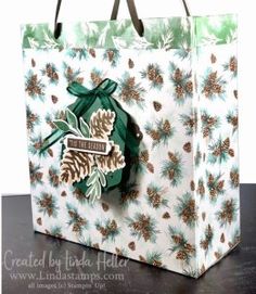 a paper bag with some pine cones on it