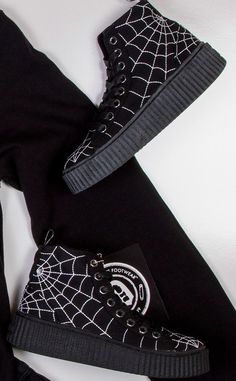 Half skate shoe, half wicked creeper. Demonia Sneekers are a comfy shoe with an edge. Black¬†canvas Spider Web Embroidery 38mm platform rubber sole High Top Lace-up U.S Mens sizing, refer to size chart for more info. Spider Web Embroidery, Web Embroidery, Comfy Shoe, Pretty Shoes Sneakers, Custom Converse, Black And White Shoes, Skate Shoe, Black High Tops, Comfy Shoes