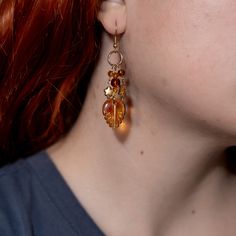 handmade whimsical fall leaf earrings inspired by the aesthetic autumn feelings of Over the Garden Wall MATERIALS: -glass and acrylic beads -gold-plated stainless steel hoop charm -Earring Hooks are 18k Gold Plated Stainless Steel + Nickel Free -Brass Huggie Hoop Earrings are 18k Gold Plated + Nickel Free As always, feel free to message me with any questions! -Holly Whimsigoth Cottagecore, Whimsical Fall, Nickel Free Jewelry, Aesthetic Autumn, Hoop Charms, Over The Garden Wall, Fall Leaf, Bee Earrings, Jewelry Beaded