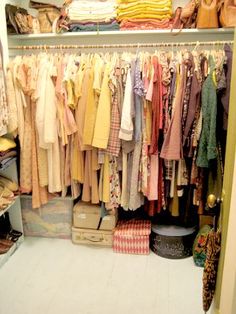 the closet is full of clothes and other items