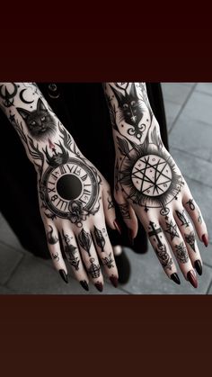 a person with tattoos on their arms and hands, both holding an analog clock in front of them