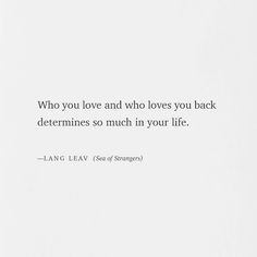 a white wall with a quote on it that says, who you love and who loves you back determines so much in your life