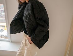 A quilted jacket with button down detail. Model is wearing MINUSEY ONE SIZE. ✔️ Free worldwide express shipping over $100✔️ Loved by 6,500+ customers✔️ Limited edition collections, maximum style⠀⠀⠀⠀⠀⠀⠀⠀⠀Stay ahead of the trend with can’t-find-anywhere-else staples. Your closet will thank you 💕 * MINUSEY ONE SIZE = EU 34-38, US 2-6* 100% Polyester Outershell with 5oz quilted lining* Dry clean* Made in Korea- Model Height: 173cm/5'8" (US4, EU36) Trendy Quilted Jacket For Work, Chic Quilted Jacket For Workwear, Black Quilted Jacket For Work, Black Quilted Long Sleeve Jacket For Work, Black Quilted Jacket With Button Closure For Fall, Black Quilted Outerwear For Work, The Trend, Quilted Jacket, Model Height